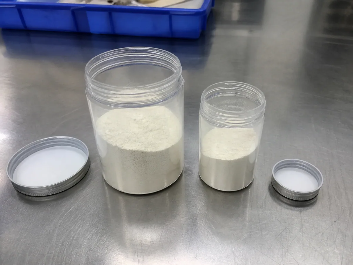 Bulk peptide raw materials in clear laboratory containers